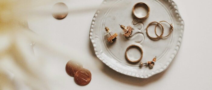 gold-colored jewelries